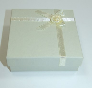 Ivory Satin Ribbon Giftbox with Rosebud Design. Size 9cm x 9cm x 3cm