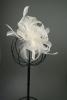 Cream Looped Net Ribbon and Feather Fascinator on a Clear Comb.  - view 3