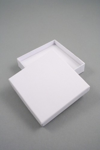 White Giftbox with White Flocked Inner. Approx Size 9cm x 9cm x 2cm