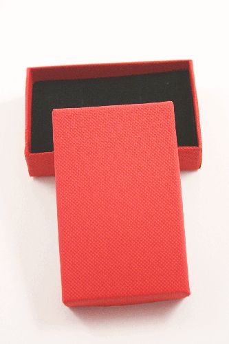 Red Gift Box with Black Flock Inner  with two corner slits for a chain and two 2cm centre slits. Approx Size 8cm x 5cm x 2.2cm