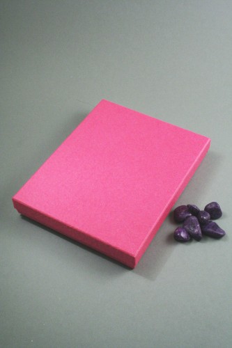 Fuchsia Pink Gift Box. Approx Size 18cm x 14cm x 2.6cm. Black Flock Pad Inner with Two Top Slits and Two Side Slits and Holes for Earring Wires.
