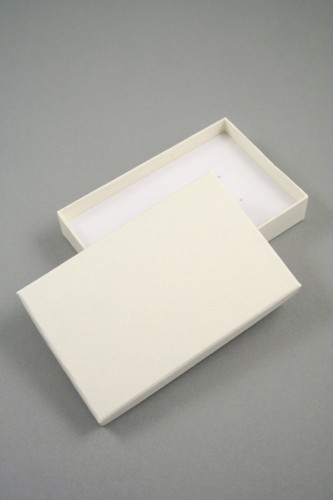 Lined Textured Cream Gift Box with White Flock Insert with top slits and holes for earrings Size 11cm x 7cm x 2.2cm.