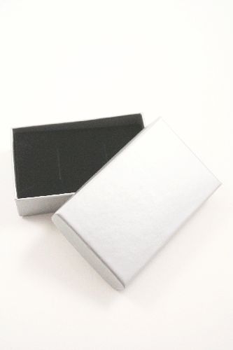 Silver Grey Giftbox. This Box Has a Black Flocked Foam Pad insert with two corner slits for a chain and two 2cm centre slits Approx Size 8cm x 5cm x 2.2cm.