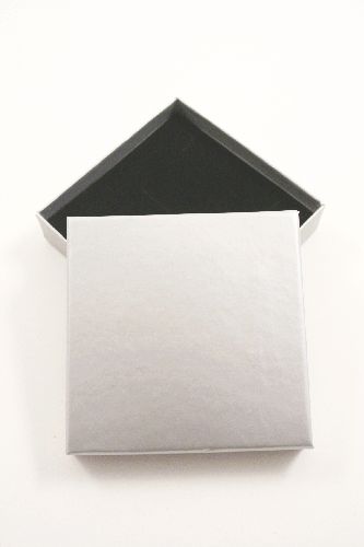 Silver Grey Giftbox. This Box Has a Black Flocked Foam Pad  insert with two corner slits for a chain and a centre 40mm slit. Approx Size 9cm x 9cm x 2cm.