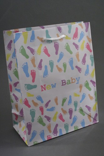 White Glossy New Baby Gift Bag with Pastel Footprints Design and White Cord Handles.  Size Approx 23cm x 18cm x 9cm