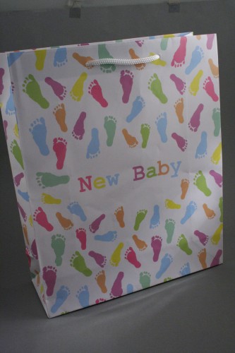White Glossy New Baby Gift Bag with Pastel Footprints Design and White Cord Handles.  Size Approx 32cm x 26cm x 10cm