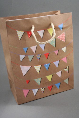 Natural Brown Gift Bag with Bright Bunting Print and Cream Cord Handles. Approx Size 23cm x 18cm x 9cm.
