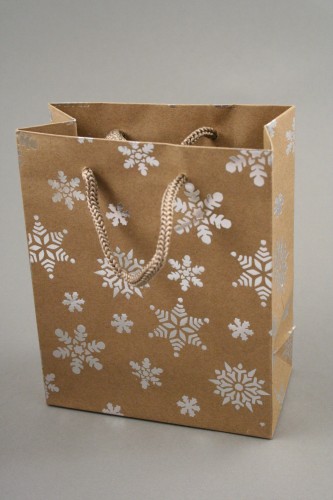 Natural Brown Kraft Paper Gift Bag with Silver Foil Snowflake Print and Brown Corded Handles. Size Approx 15cm x 12cm x 6cm.