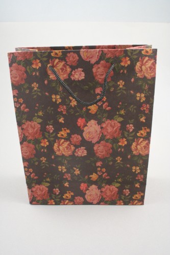 Black Floral Printed Kraft Paper Gift Bag with Black Corded Handles. Size Approx 24cm x 19cm x 8cm.