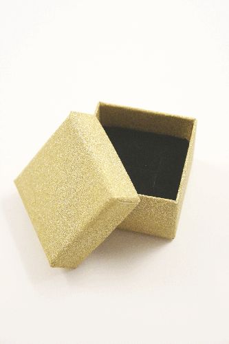 Gold Glitter Gift Box. Size Approx 5cm x 5cm x 3.5cm. This box has a black flocked foam pad insert with an H shaped slit to fit a ring shank.