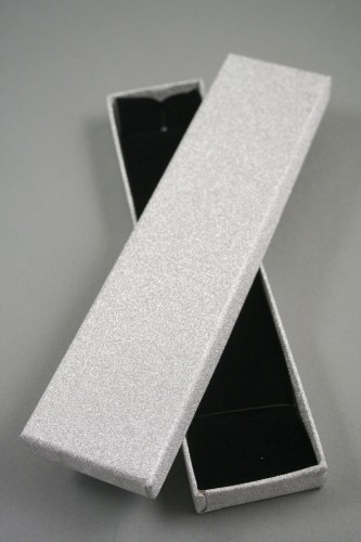 Silver Glitter Gift Box. Size Approx 21cm x 4.5cm x 1.8cm. This box has a black flocked foam pad insert