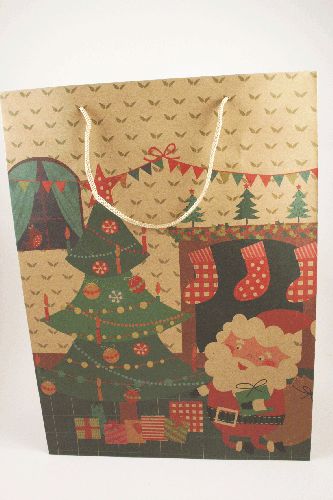 Natural Kraft Paper Gift Bag with Christmas Tree and Santa Scene. Natural Cord Handles. Size Approx 42cm x 31cm x 15cm.