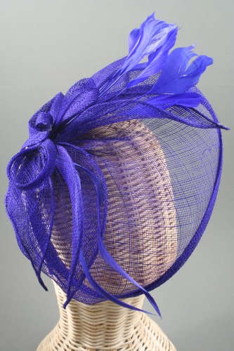 Looped Royal Blue Sinamay Hatinator on a Narrow Black Satin Wrapped Aliceband. 