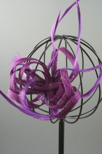Purple Coloured Looped Sinamay Net and Feather Fascinator on a Beak Clip with Brooch Pin