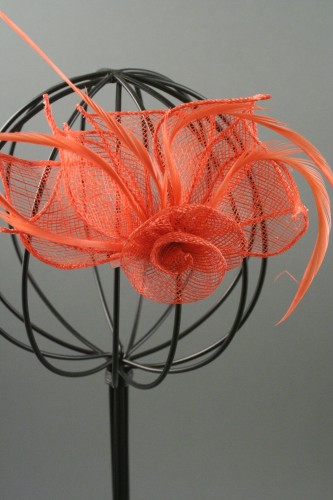 Coral Looped Fabric Flower and Feather Fascinator on a Ribbon Wrapped Aliceband. 