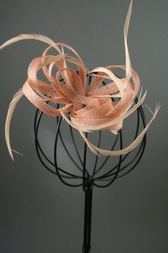 Nude Coloured Looped Sinamay Net and Feather Fascinator on a Beak Clip with Brooch Pin