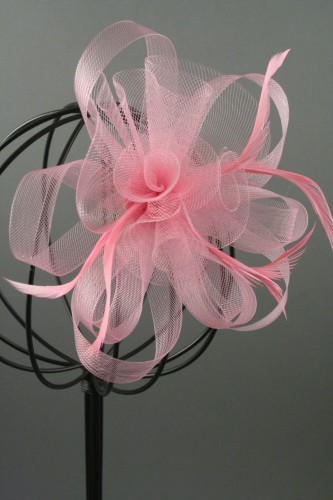 Looped Rose Pink Net Centre Rosette and Feather Fascinator on a Clip and Brooch Pin.