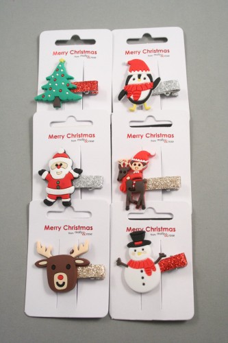 Rubber Christmas Character Glitter Beak Clips. In Santa, Penguin, Snowman, Christmas Tree, Reindeer and Elf Designs on a Clip Strip. Approx 3cm