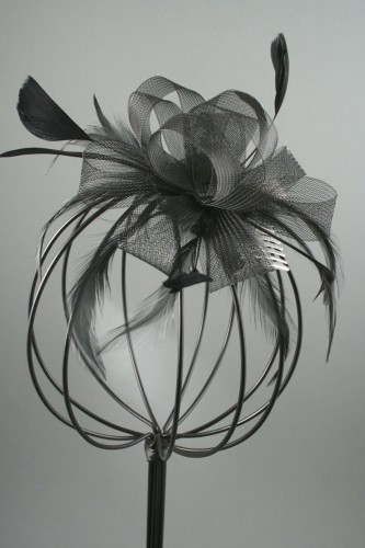 Black Looped Net Ribbon and Feather Fascinator on a Clear Comb. 