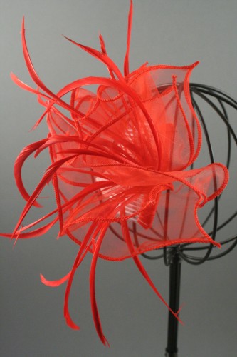 Red Looped Fabric and Feather Fascinator on a Clear Comb