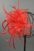 Red Looped Fabric and Feather Fascinator on a Clear Comb - view 1