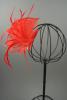 Red Looped Fabric and Feather Fascinator on a Clear Comb - view 3