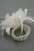 Cream Feather and Flower Corsage on a 4 Row Pearl Bead Wristband - view 1