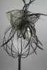 Black Looped Fabric and Feather Fascinator on a Clear Comb - view 1