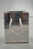 Silver Snowflake Christmas Print Holographic Gift Bag with Grey Cord Handles. Approx Size 10cm x 8cm x 4.5cm - view 2