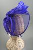 Looped Royal Blue Sinamay Hatinator on a Narrow Black Satin Wrapped Aliceband.  - view 2