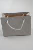 Silver Printed Kraft Paper Gift Bag with Black Cord Handles. Approx Size 11cm x 14.5cm x 6cm (Landscape) - view 1