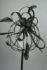 Large Black Coiled Net and Feather Fascinator on a Clear Comb.  - view 1