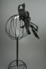 Large Black Coiled Net and Feather Fascinator on a Clear Comb.  - view 3