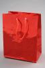 Red Holographic Foil Gift Bag with Red Corded Handles. Approx Size 14.5cm x 11.5cm x 6.5cm - view 1